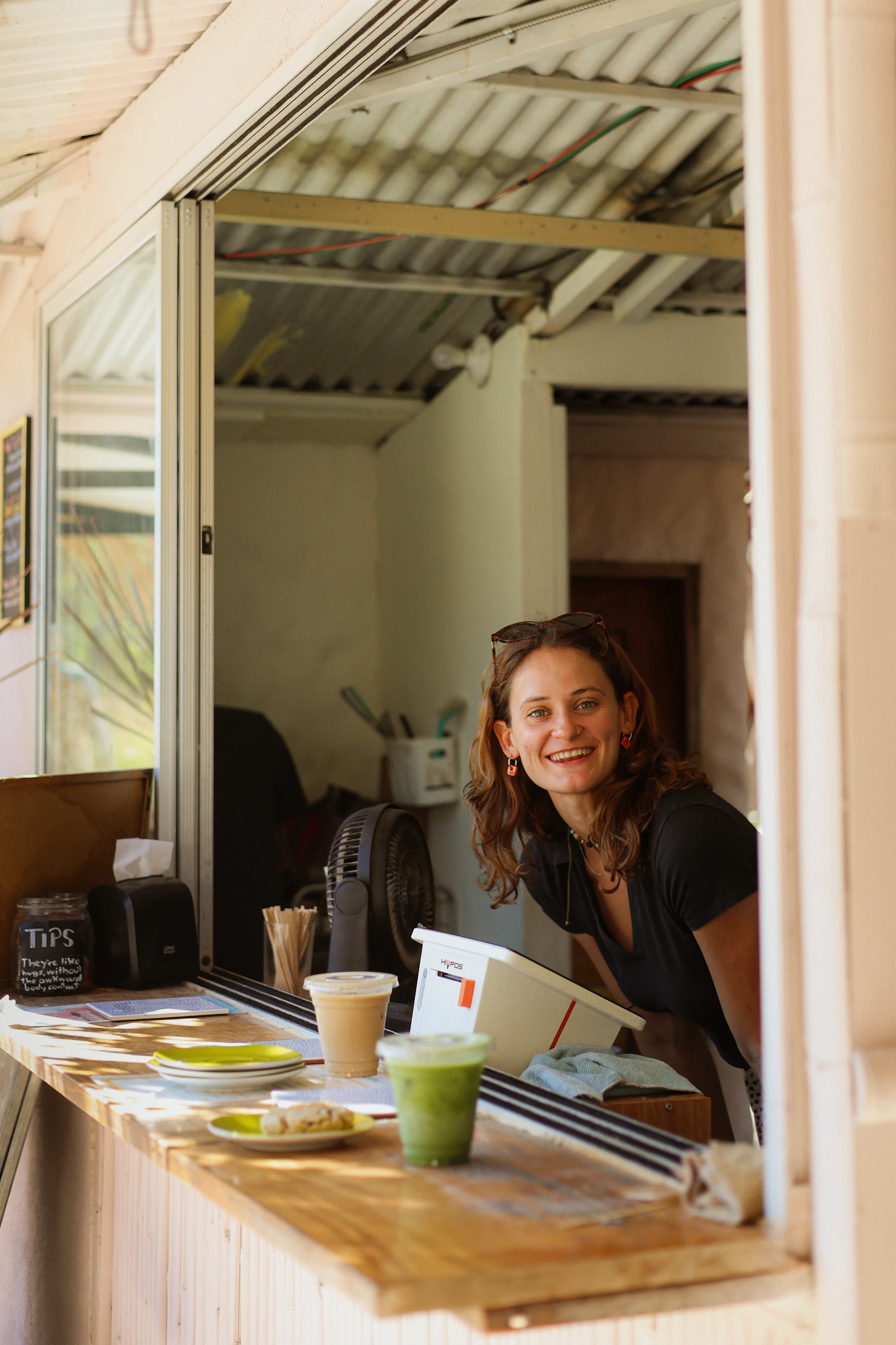 Jess at the Swells Café window